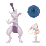 Figurines Mewtwo articulée et Mew sur son socle, hors emballage, avec le disque d'attaque bleu