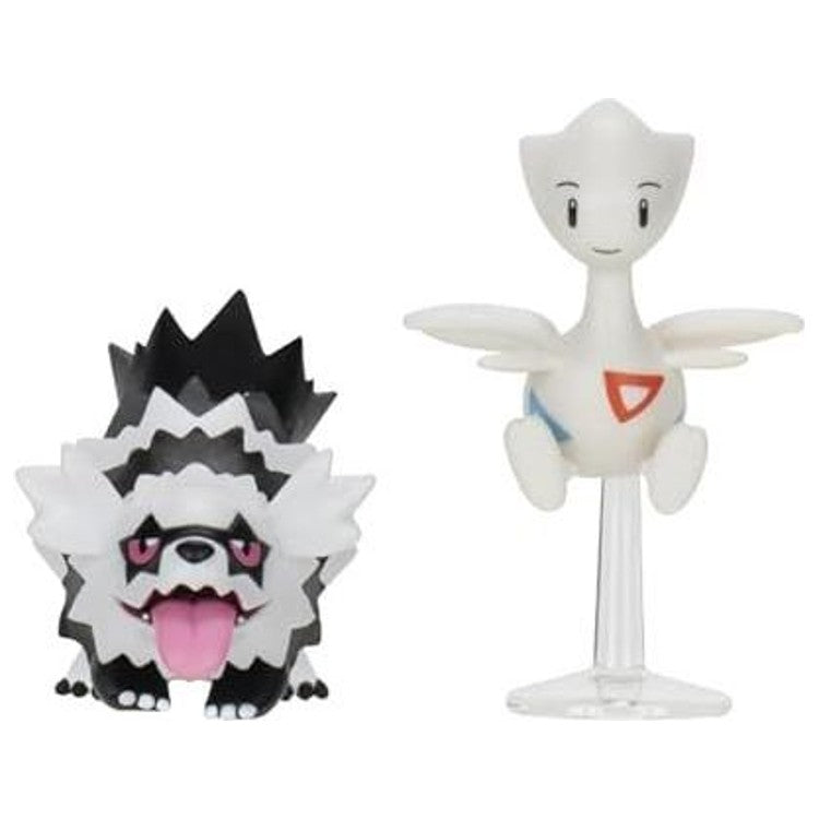 Les deux figurines hors emballage : Zigzaton de Galar et Togetic sur son socle transparent