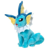 Peluche Aquali assise de trois quarts, nageoires jaunes des oreilles
