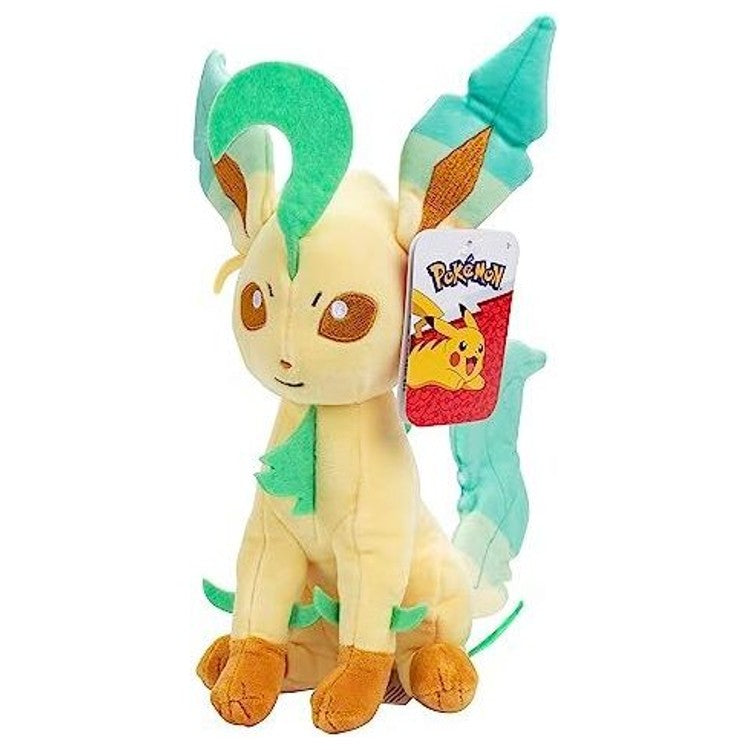 Peluche Folipurba 20 cm installée sur un lit dans une chambre d’enfant, en décoration Pokémon.