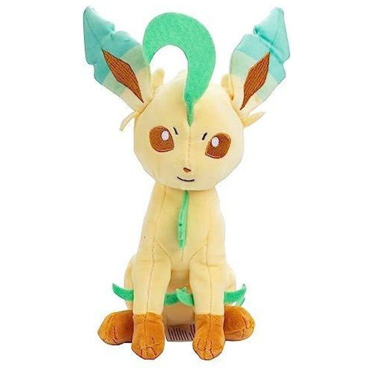 Peluche Folipurba 20 cm vue de face, montrant son expression douce et ses grandes feuilles vertes.