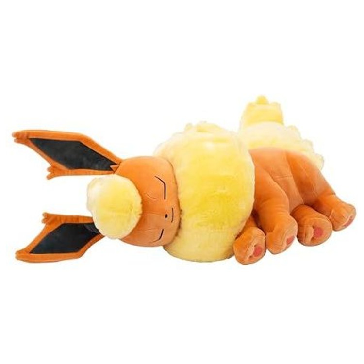 Gros plan sur la tête de la peluche Pyroli 45 cm, avec ses grandes oreilles et ses yeux fermés dans une expression paisible.