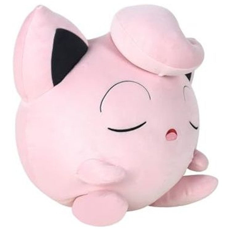 Peluche Rondoudou 46 cm posée à côté d’un enfant pour montrer l’échelle et la taille imposante du doudou.