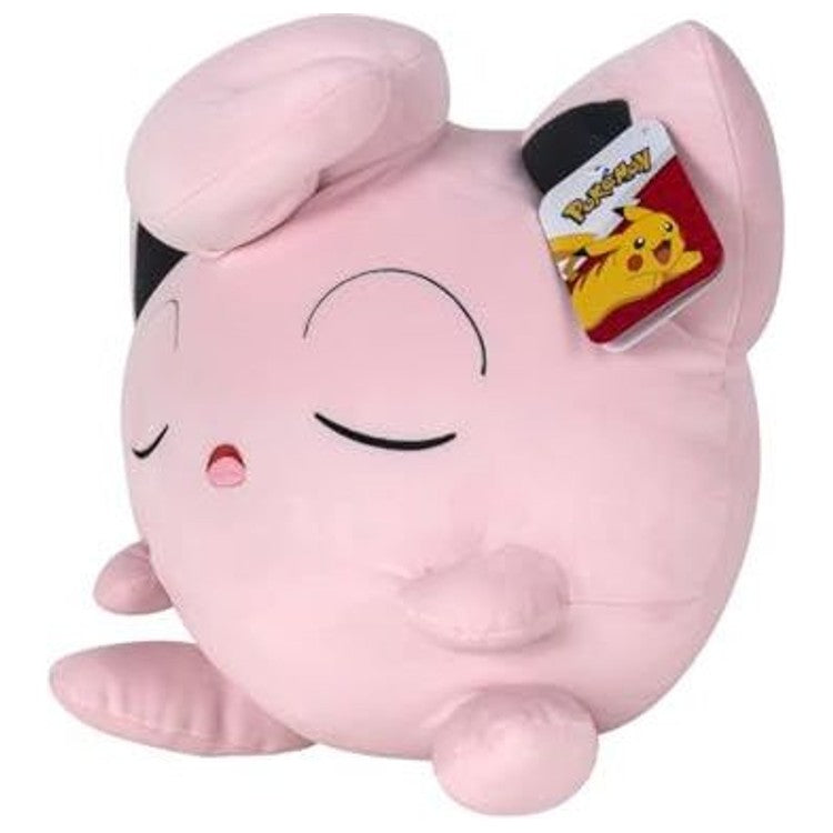 Peluche Rondoudou 46 cm vue de face, en position de sommeil, montrant sa forme ronde et ses grands yeux fermés.